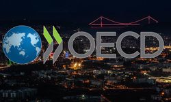 OECD, küresel ekonomide bu yıla ilişkin büyüme tahminini yükseltti